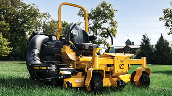 man riding commercial lawn mower